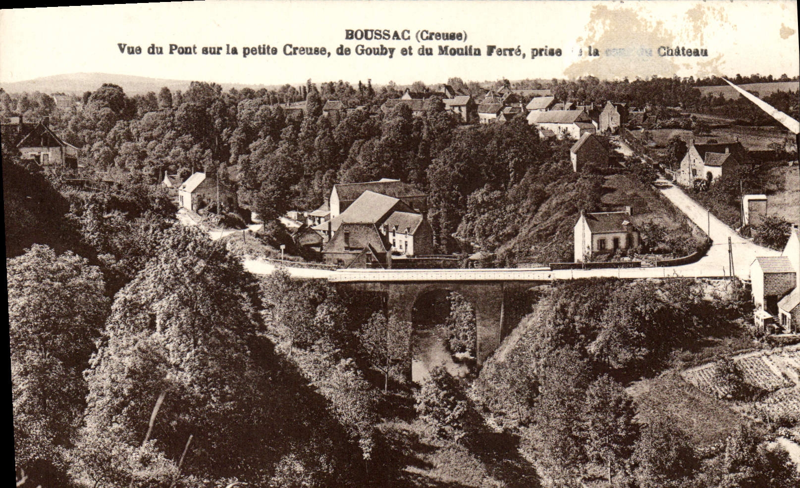Boussac (Creuse) — Vue du pont sur la petite Creuse, de Gouby et du Moulin Ferré, prise de la cour du Château