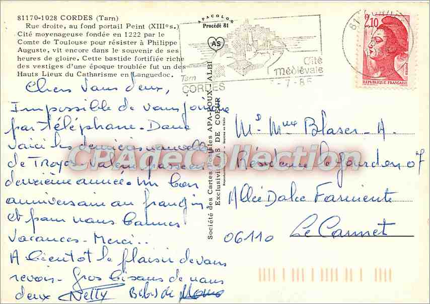 Cordes-sur-Ciel — rue médiévale avec boutique de céramique et bois de poupées — AS — Reverso