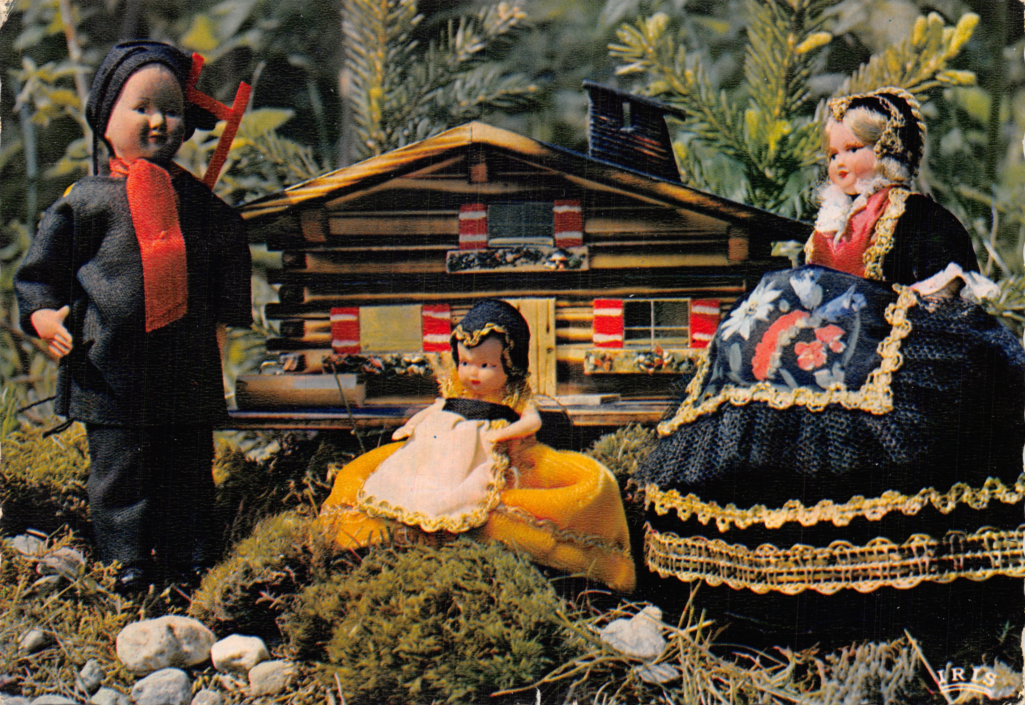 Berglandschap — drie poppen voor een houten hut — uitgever IRIS
