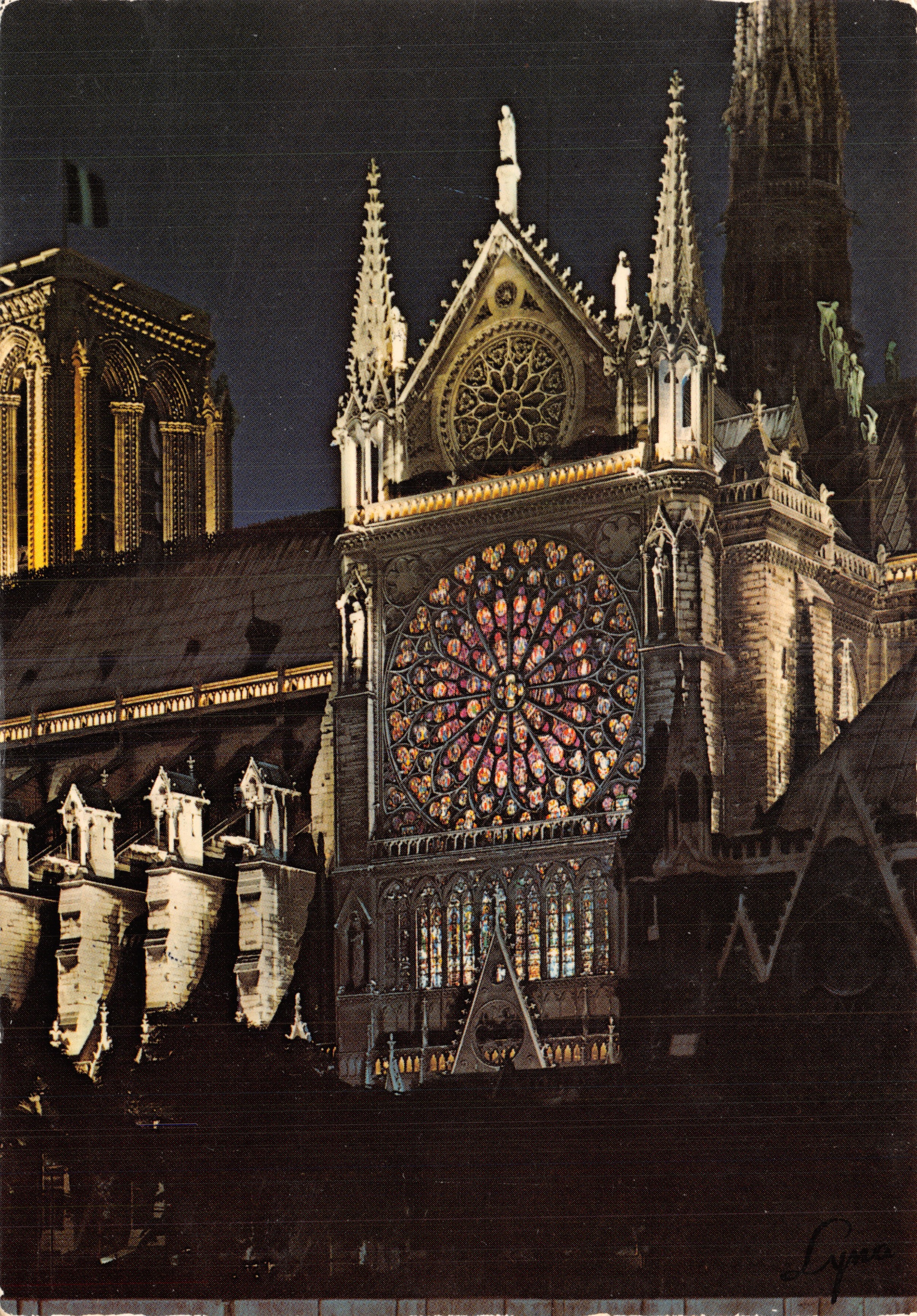 Notre-Dame de Paris — verlichte gevels 's nachts — uitgever LYNÁ