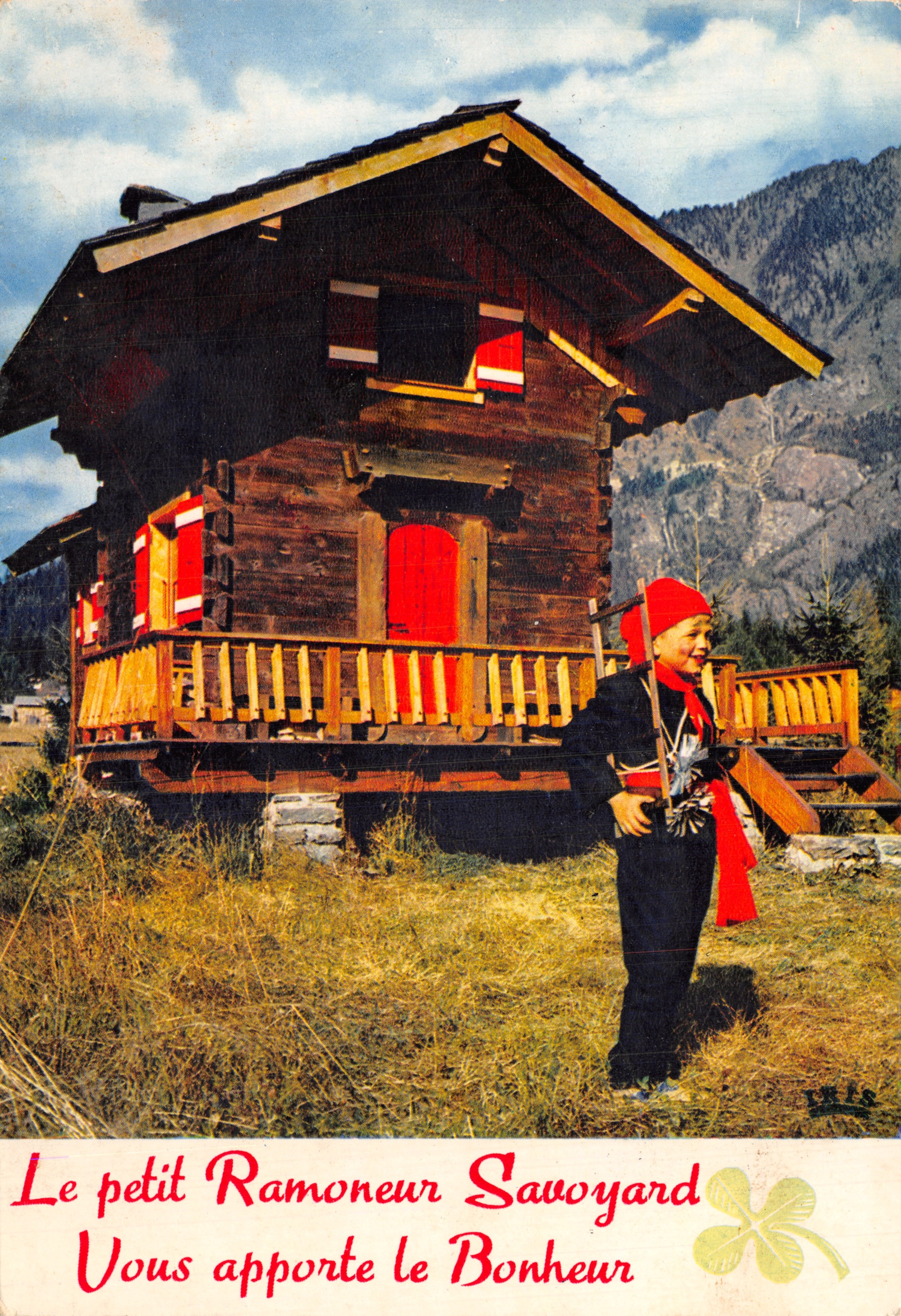 Il piccolo Ramoneur Savoyardo — casa in legno con balcone, montagne in primo piano — editore IRIS