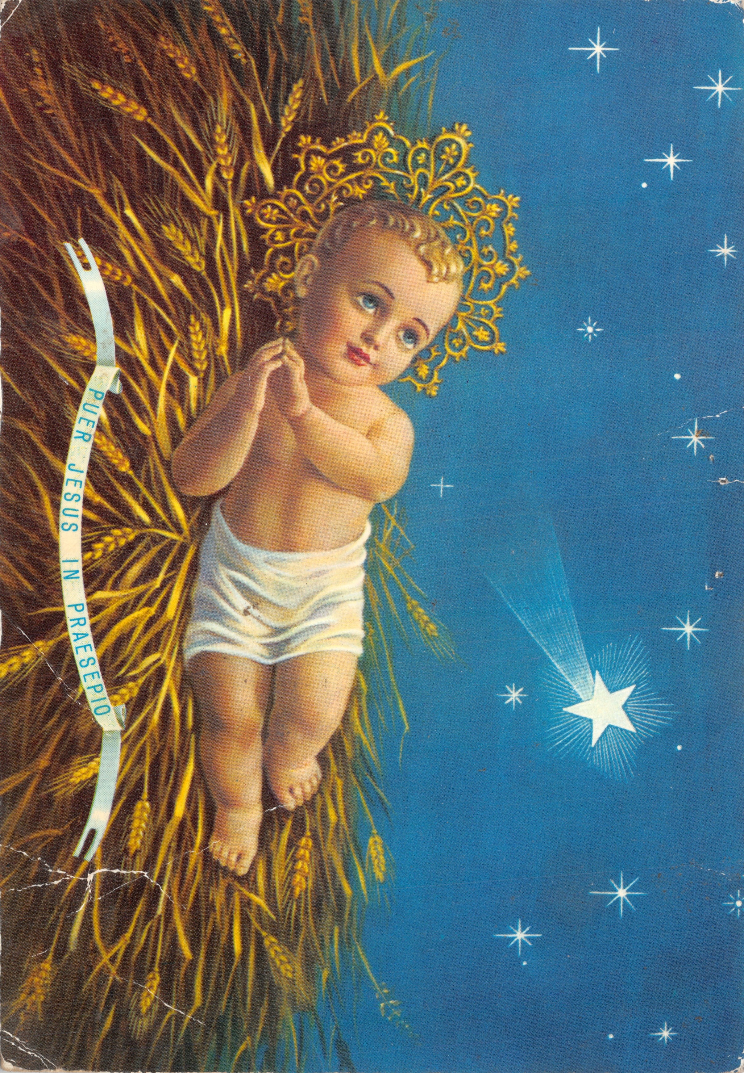 Dziecię Jezus na presepio — dziecię koronowane złotem otoczone pszenicą pod gwiazdami, wydawca Ed. Custodia di Terra Santa, numer seryjny nie widoczny