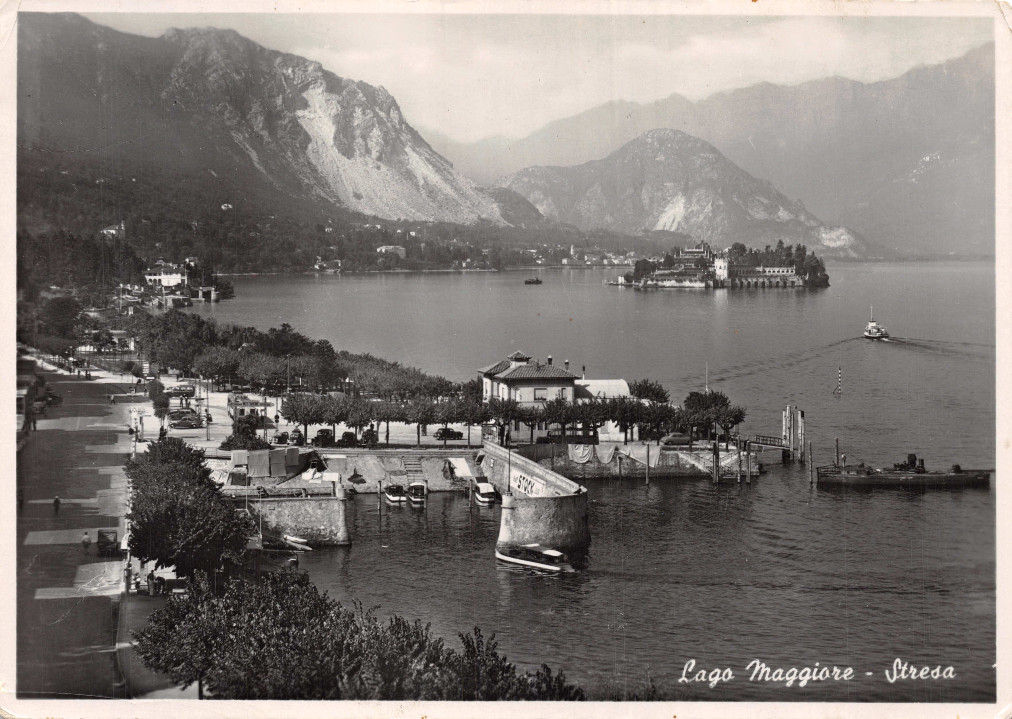 Lake Maggiore - Stresa — view of the lake with the island of San Giulio and the port, publisher REGGIORI Photostamp - Laveno M