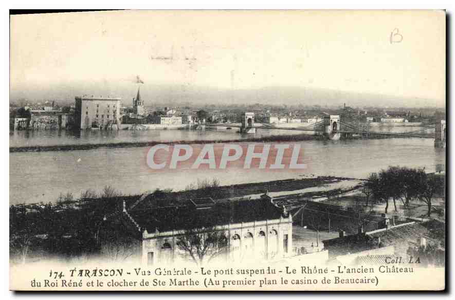 Tarascon - Vue Générale - Le pont suspendu - Le Rhône - L'ancien Château du Roi René et le clocher de Ste Marthe (Au premier plan le casino de Beaucaire)