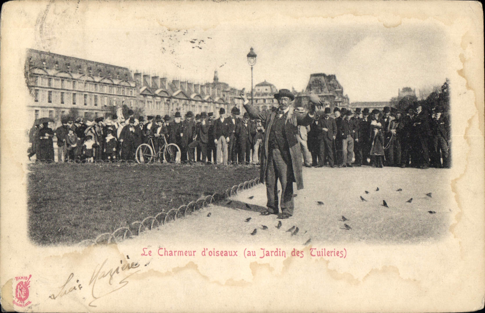 Le Charmeur d'oiseaux (au Jardin des Tuileries) — éditeur : Théophile Marique, n° de série non visible