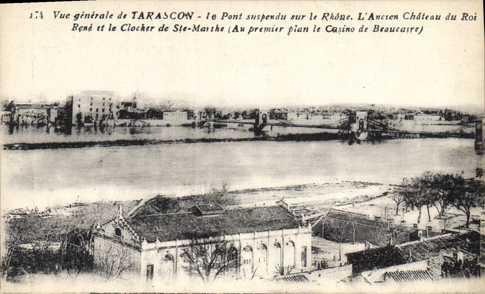 Vue générale de TARASCON — le Pont suspendu sur le Rhône, L'Ancien Château du Roi, le Clocher de Ste-Marthe (Au premier plan le Casino de Beaucaire)