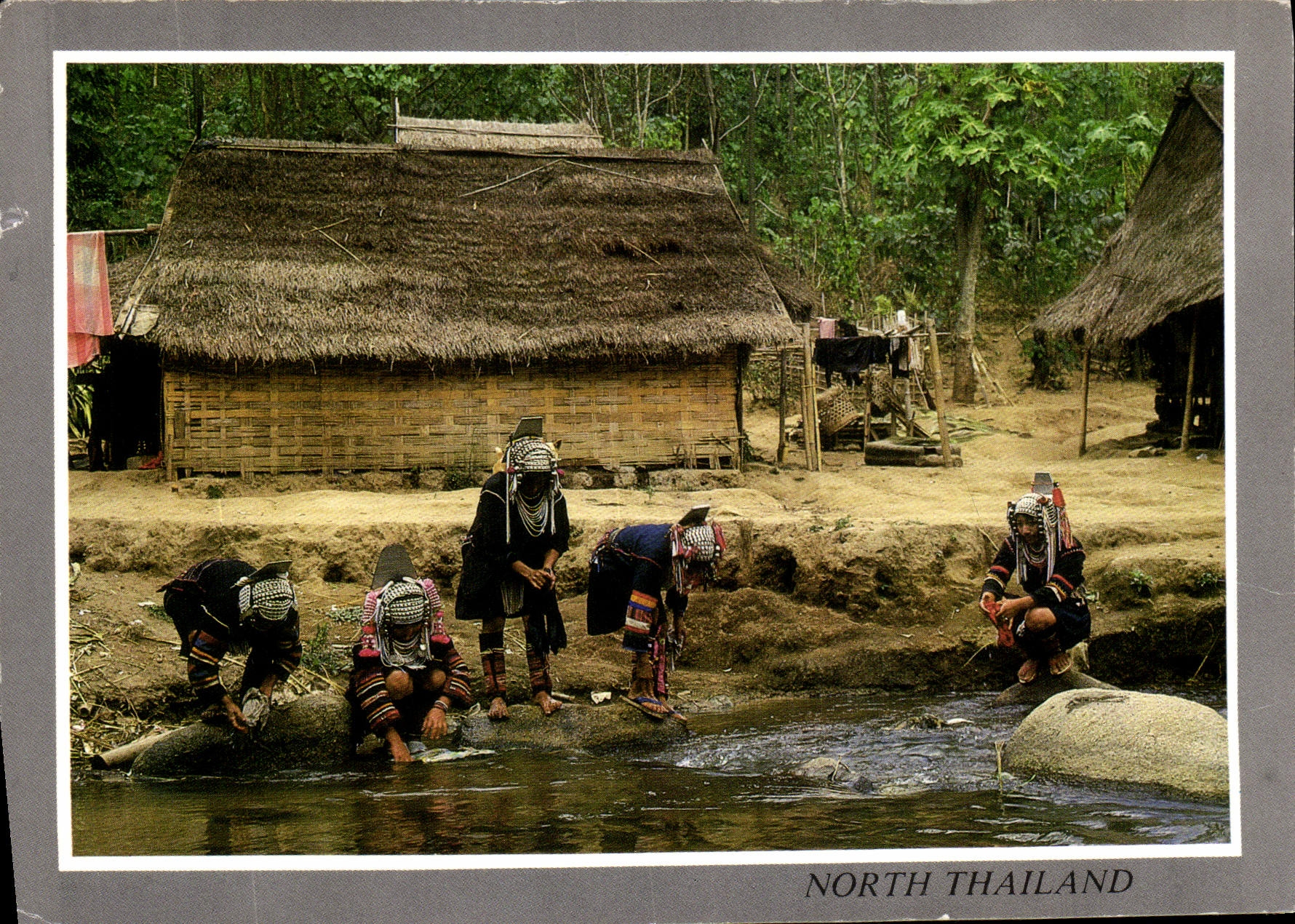 CPM Eko Hilltribe women group are washing clothes at the Stream North Thailand 