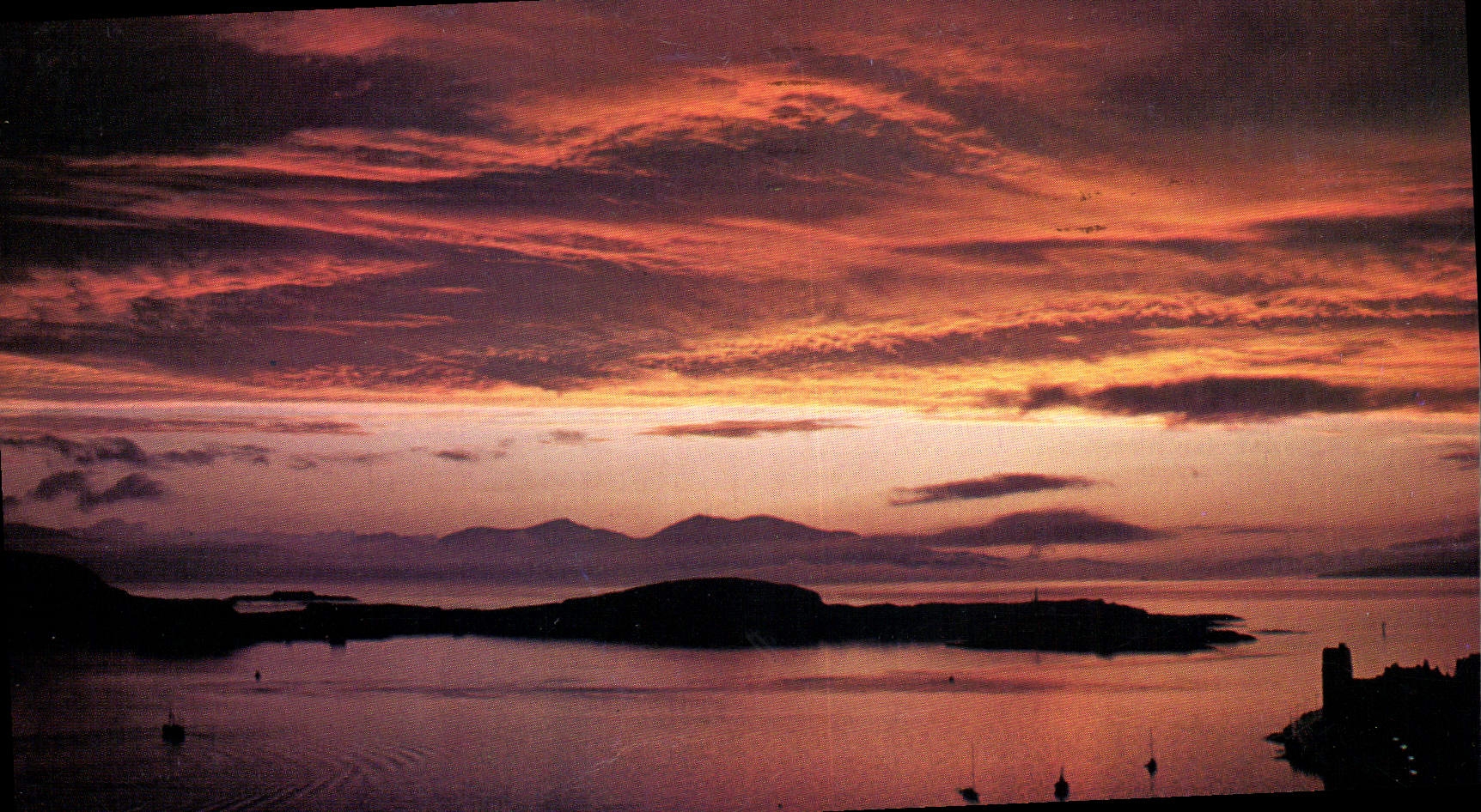 Sunset over Oban Bay and the islands of Mull and Kerrera, Oban, Argyll — Photograph by Dennis Hardley, BERIC TEMPEST COLOURCARD