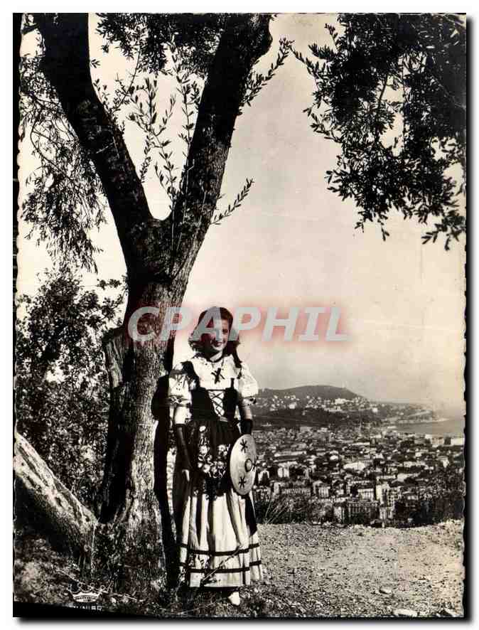 CPM Nice Jeune Fille en costume local vue prise de St Pierre de Ferie 