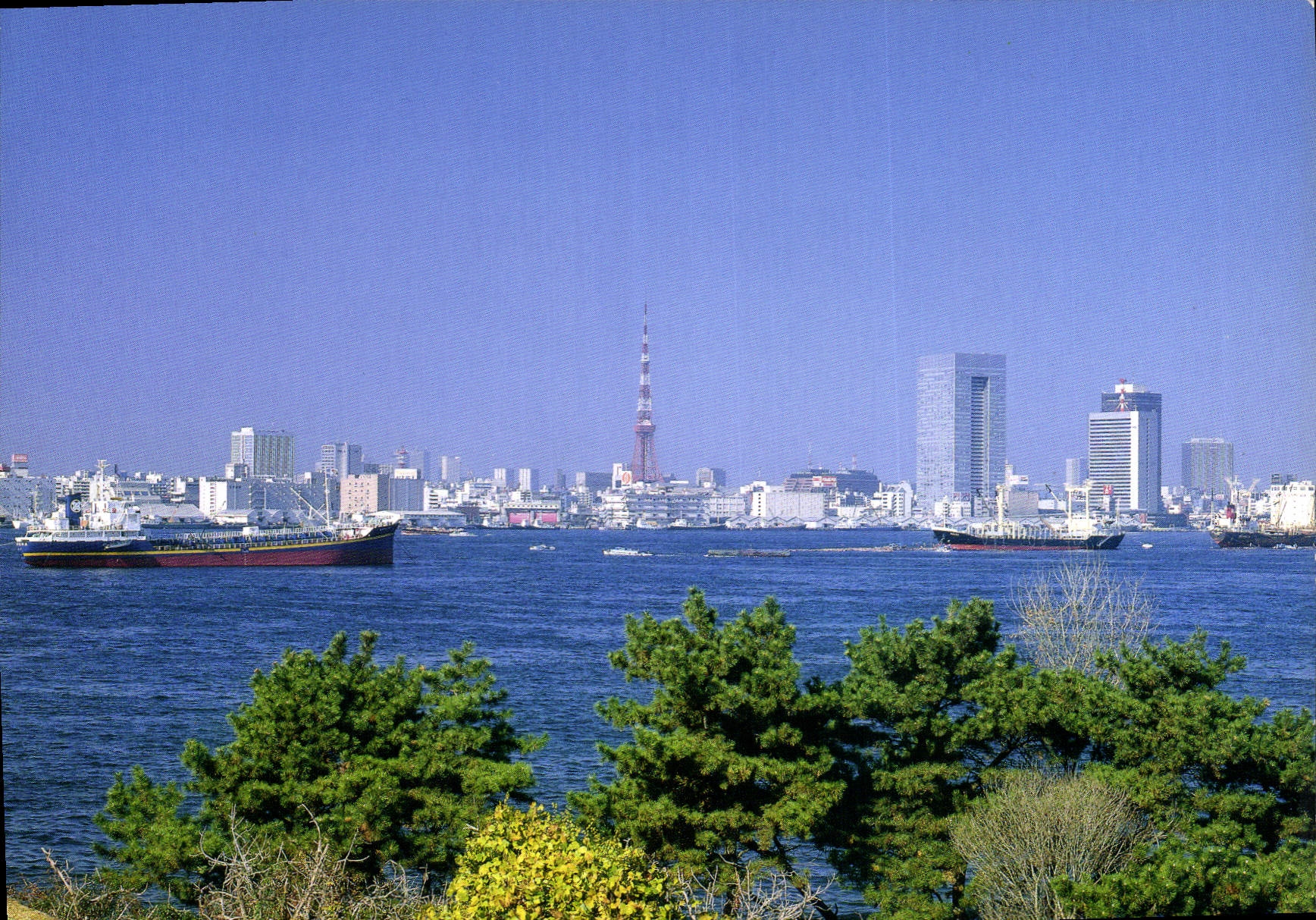 CPM Tokyo Tower and the Hamamatsucho area as seen from traveling ships in Tokyo Bay 