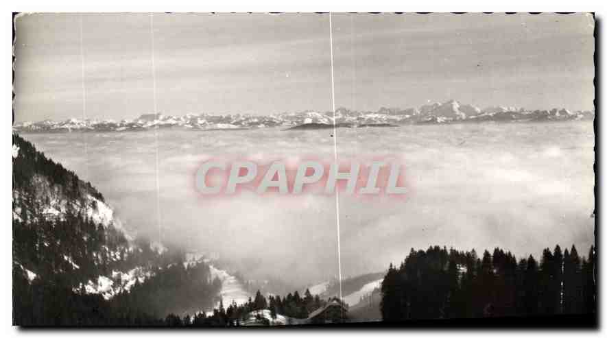 CPM La Route Blanche Paris Geneve la mer de brouillards le Mont Blanc et les Alpes vus du Col de la 