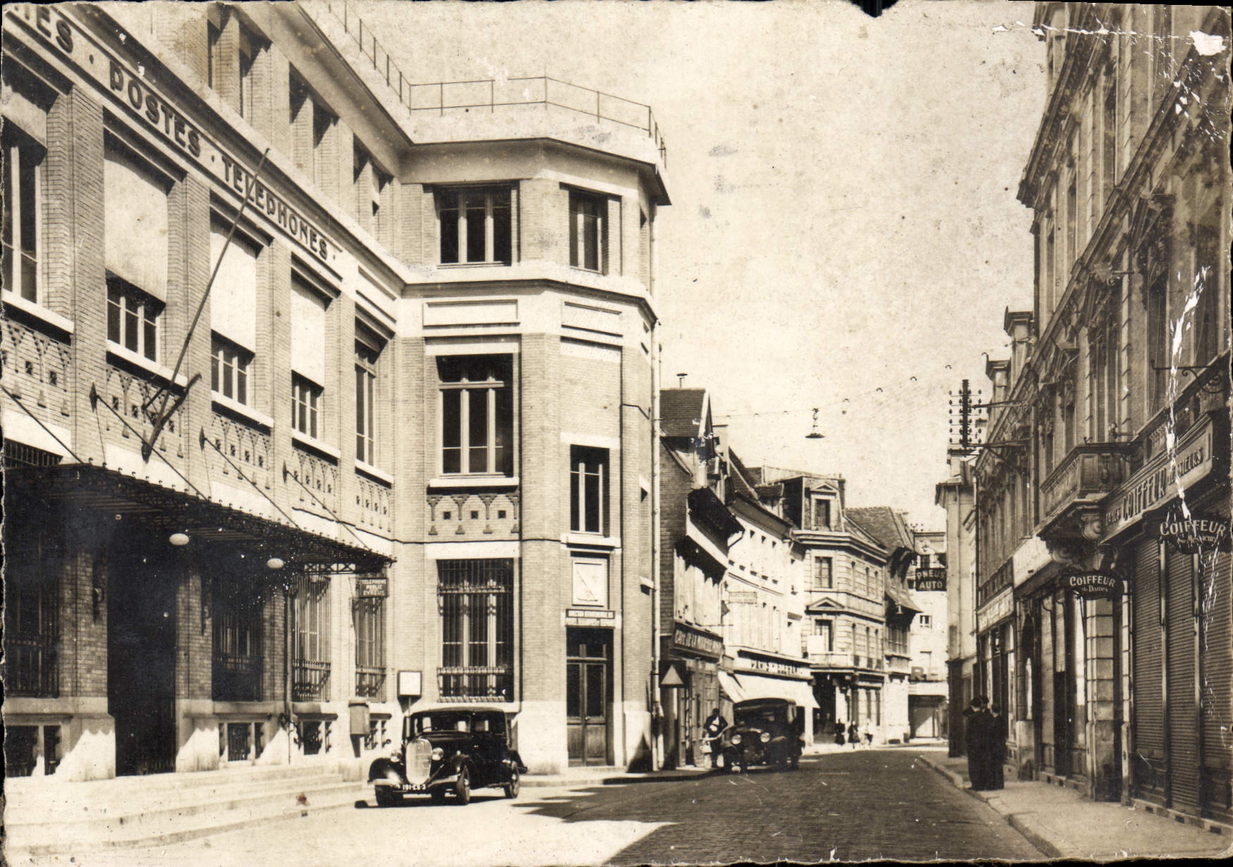 CPM Evreux Eure La Grande Poste et la Grande Rue Automobile