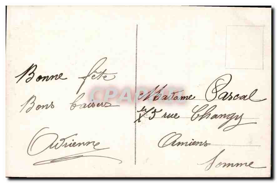 Jeune femme en robe à rayures tenant un bouquet de roses — REX 4096 — éditeur REX — Verso