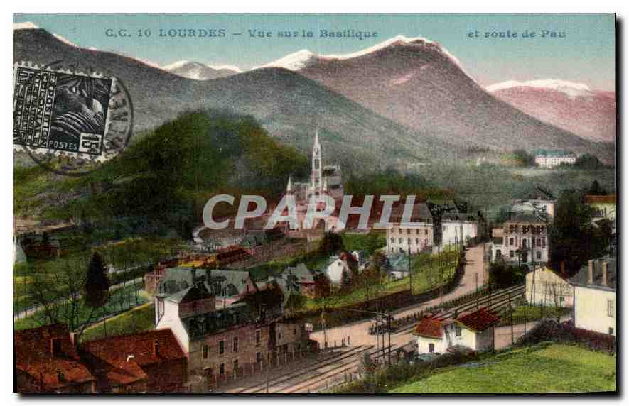 CPA Lourdes Vue sur la Basilique et route de Pau 