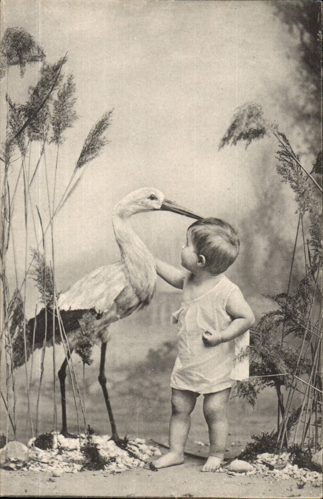 CPA Fantaisie Enfant et cigogne 