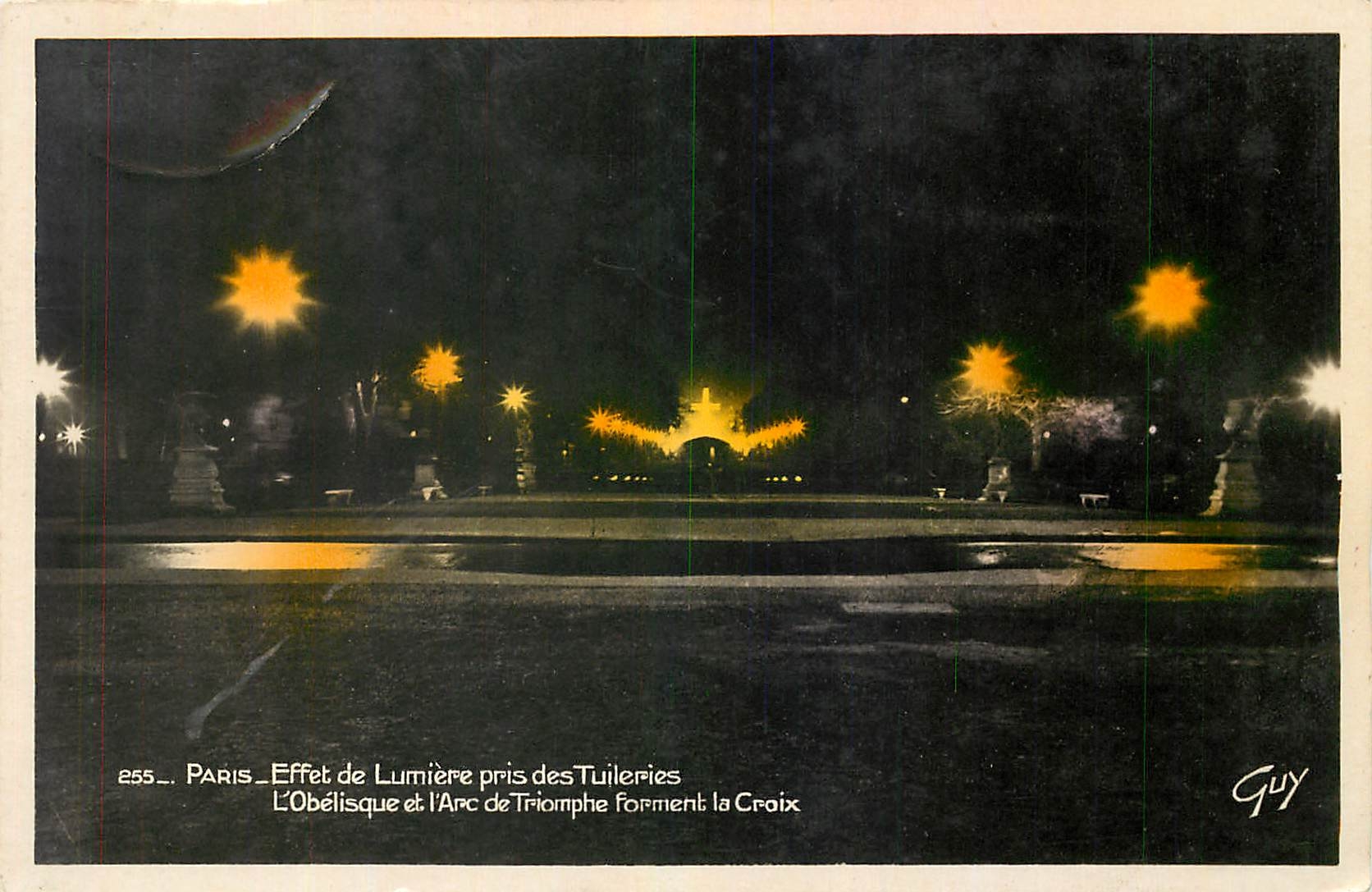 CPA Paris Effet de Lumiere des Tuileries l'Obelisque et l'Arc de Triomphe forment la Croix 