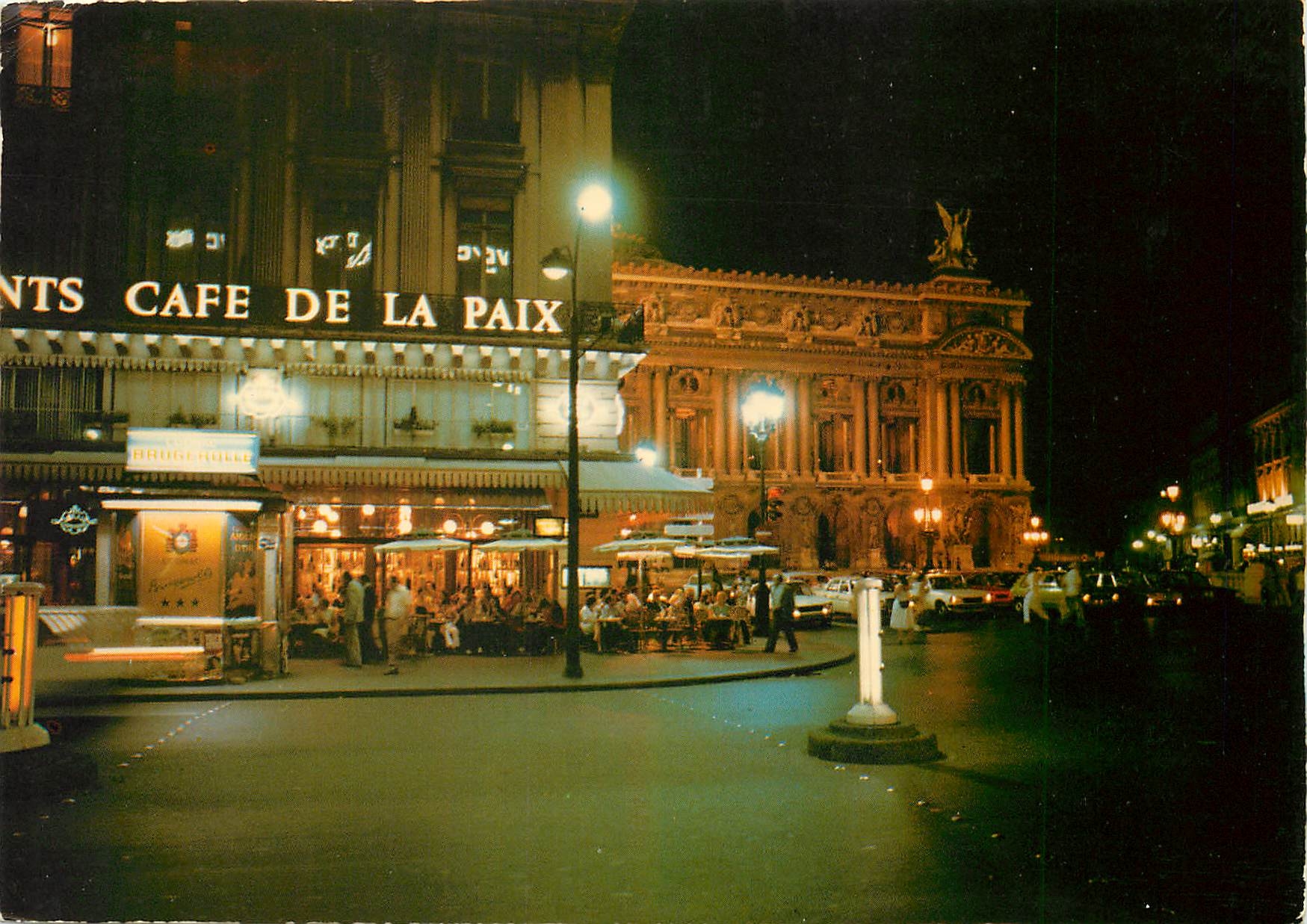 CPM Paris la nuit Place de l'Opera Cafe de la Paix