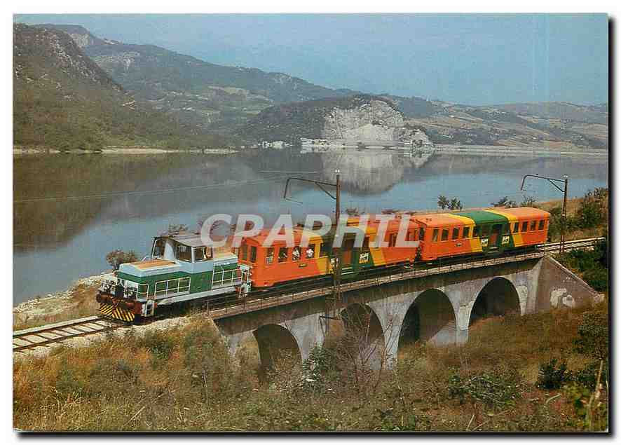 CPM Ferrovia Adriatico Sangritana The coloured Valley Train runs along the Bomba Lake 