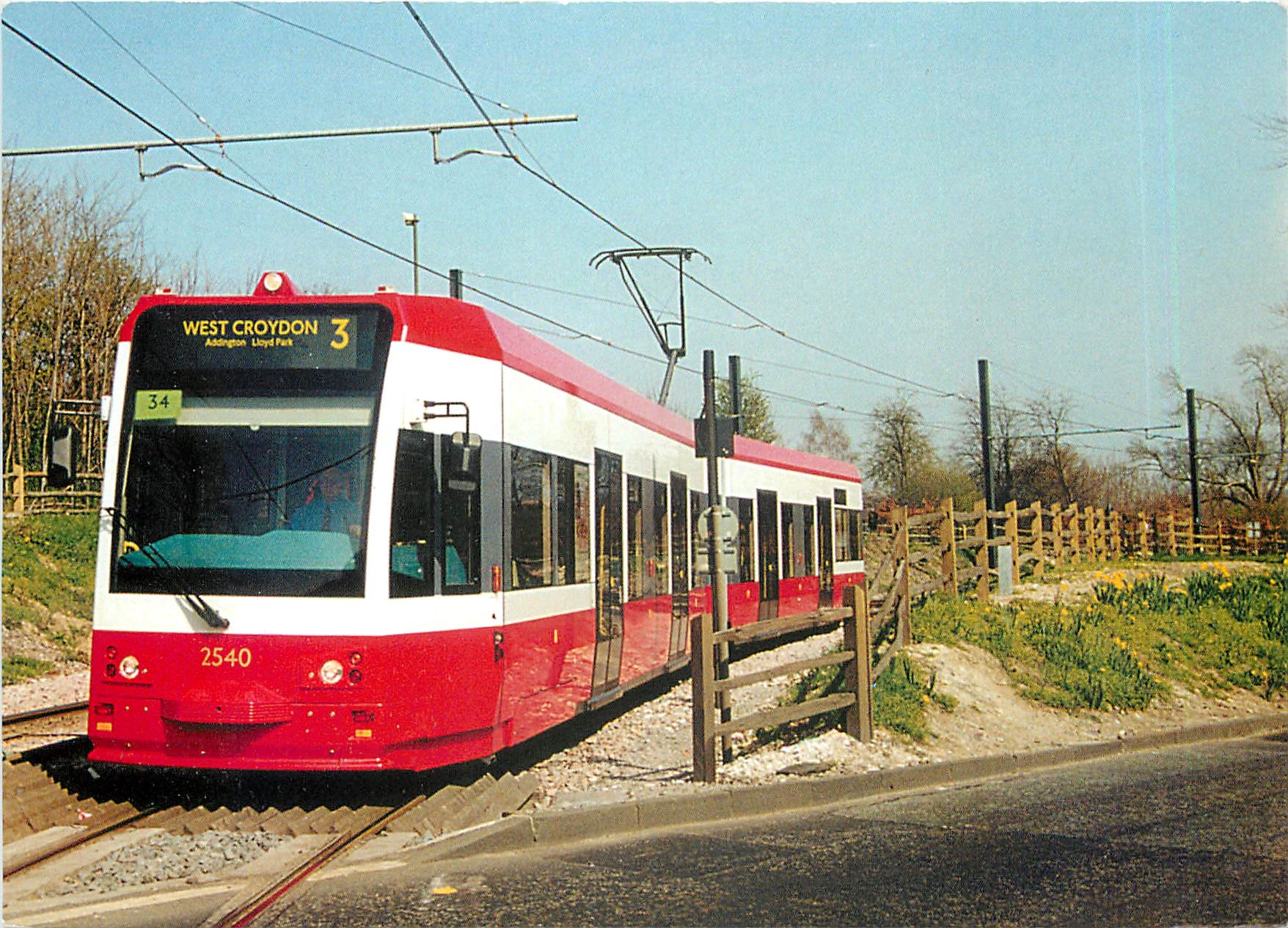 CPM Croydon Tramlink Car No.2540 at the Gravel Hill level crossing
