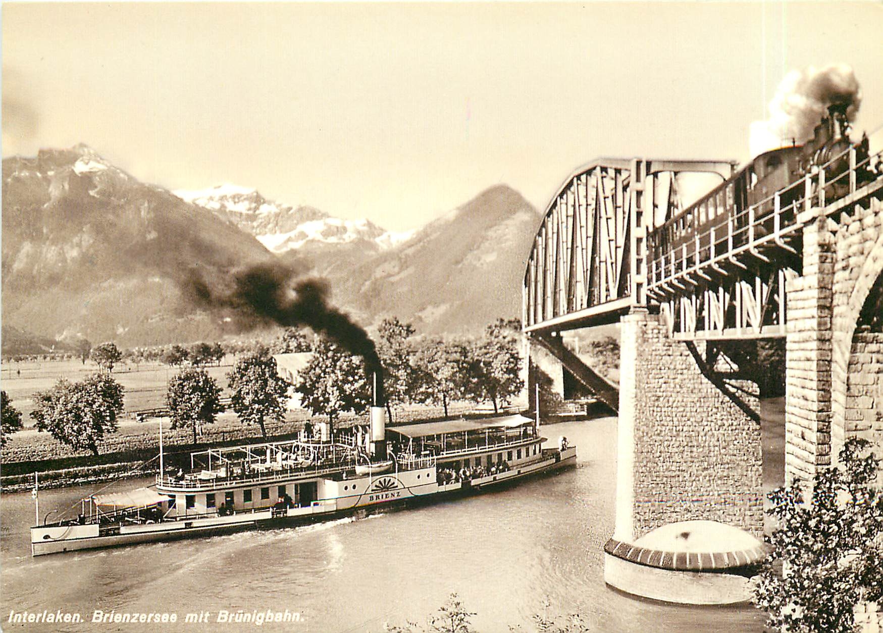 CPM Un train a vapeur de la ligne de Brunig franchit le canal de l'Aar ores d'Interlaken Ost vers 19