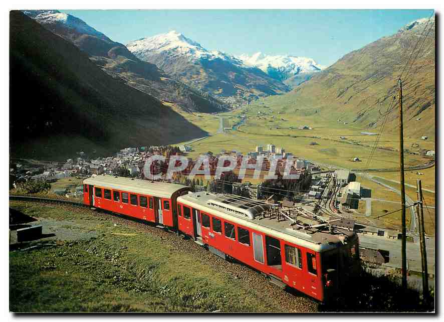 CPM Andermatt 1444m mit Furka-Oberalp-Bahn