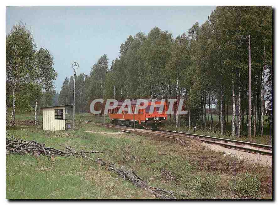 CPM Class dmu passes the small halt at Tjunnaryd on the Nassjo nydro line
