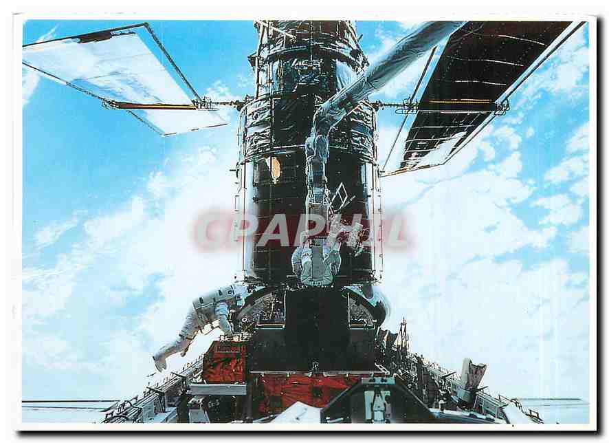 CPM Kennedy Space Center Astronauts install a Fine Guidance Sensor into a protective enclosure in th