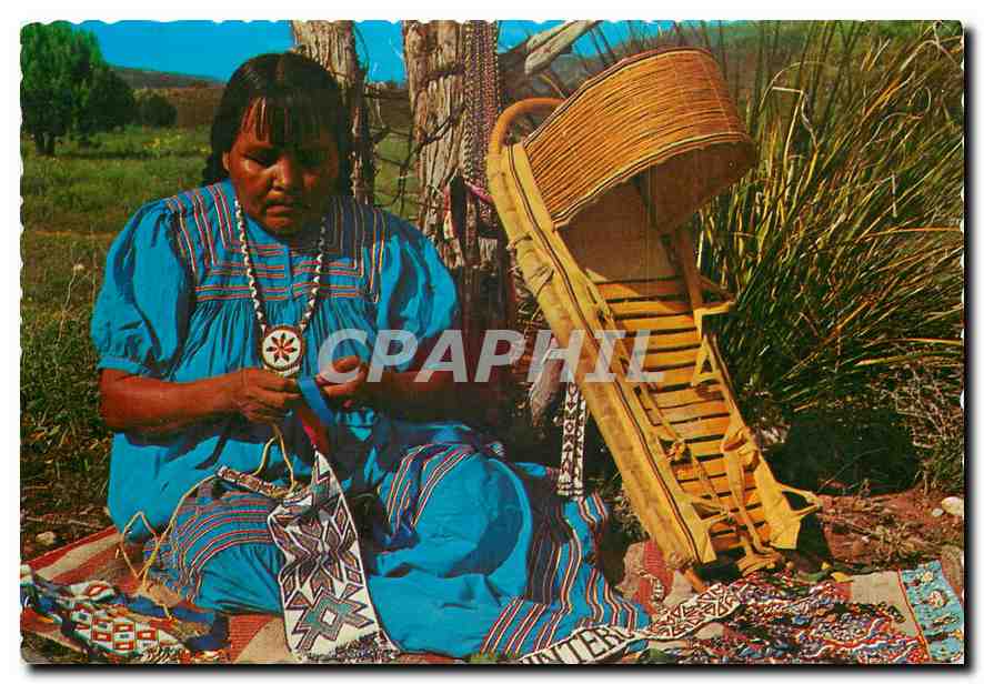CPM Apache Bead Maker A skilled worker displays her necklaces ties belts hat bands and medallions ma