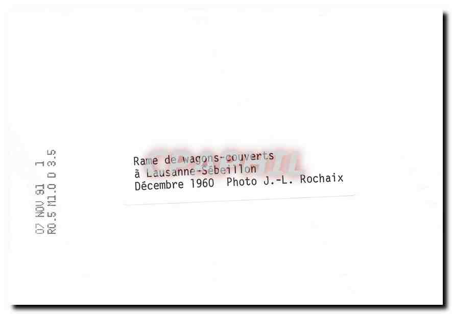 CPM Rame de wagons-couverts a Lausanne-Sebeillon Decembre 1960 — Verso