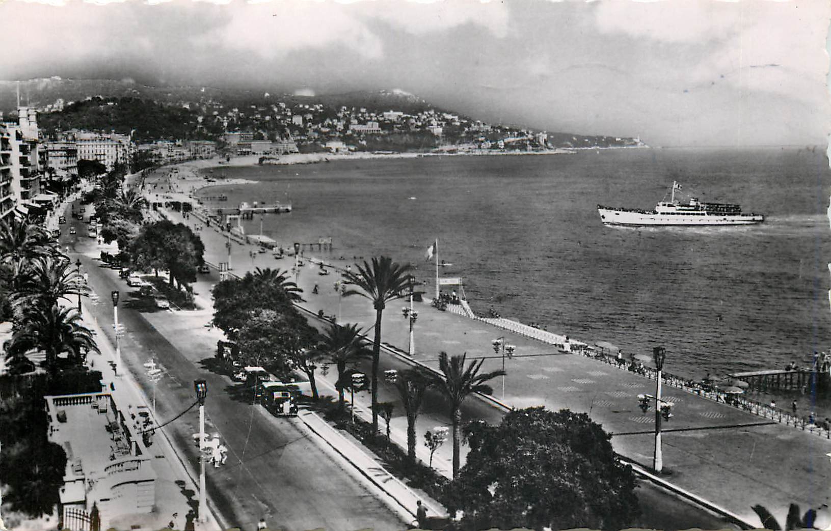 CPM Nice La Promenade des Anglais le Mont Boron et le bateau de Croisteres Le Gallus 