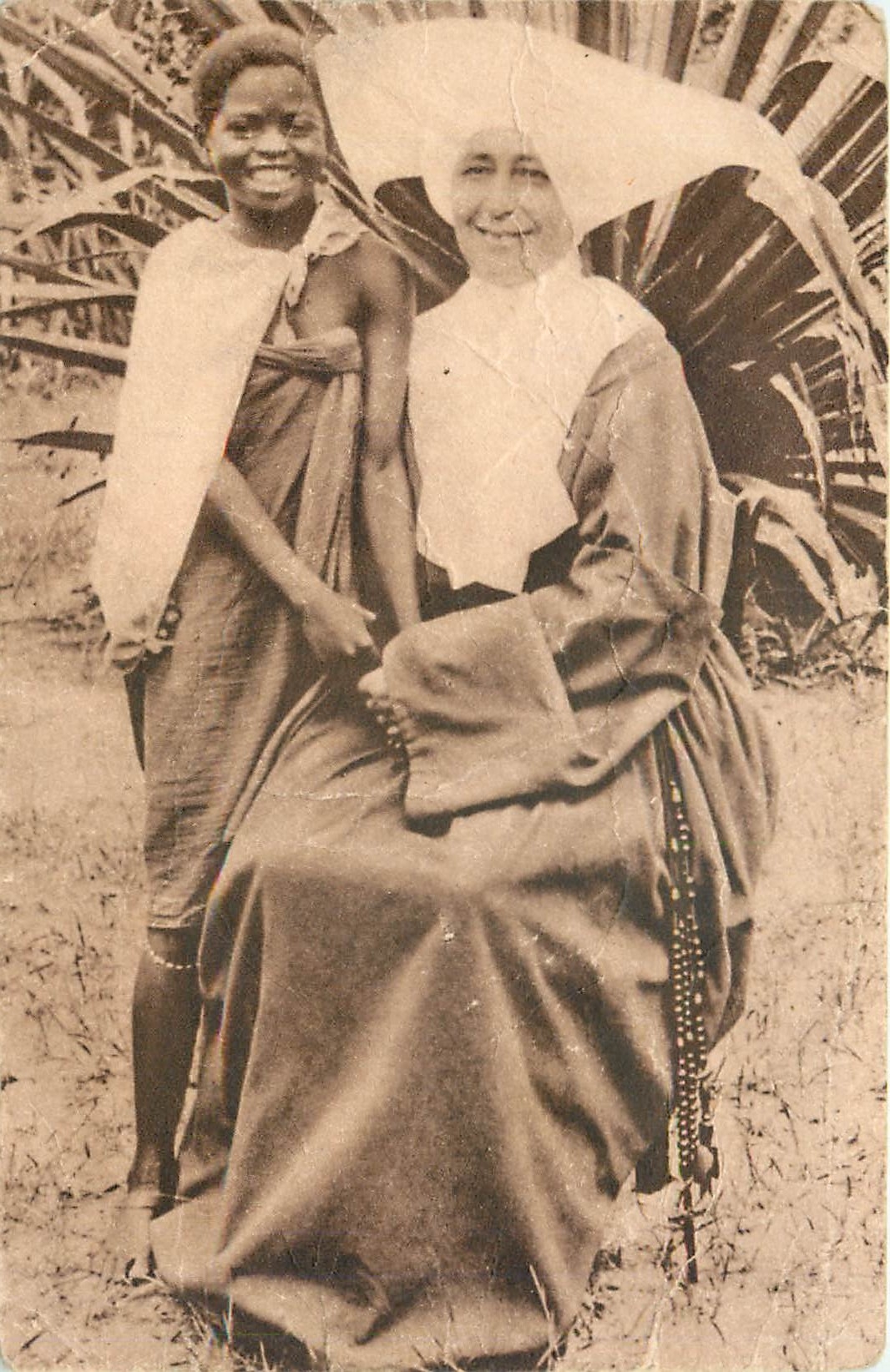 Sourire africain — Missionnaire et enfant — Édition des Missions d'Afrique