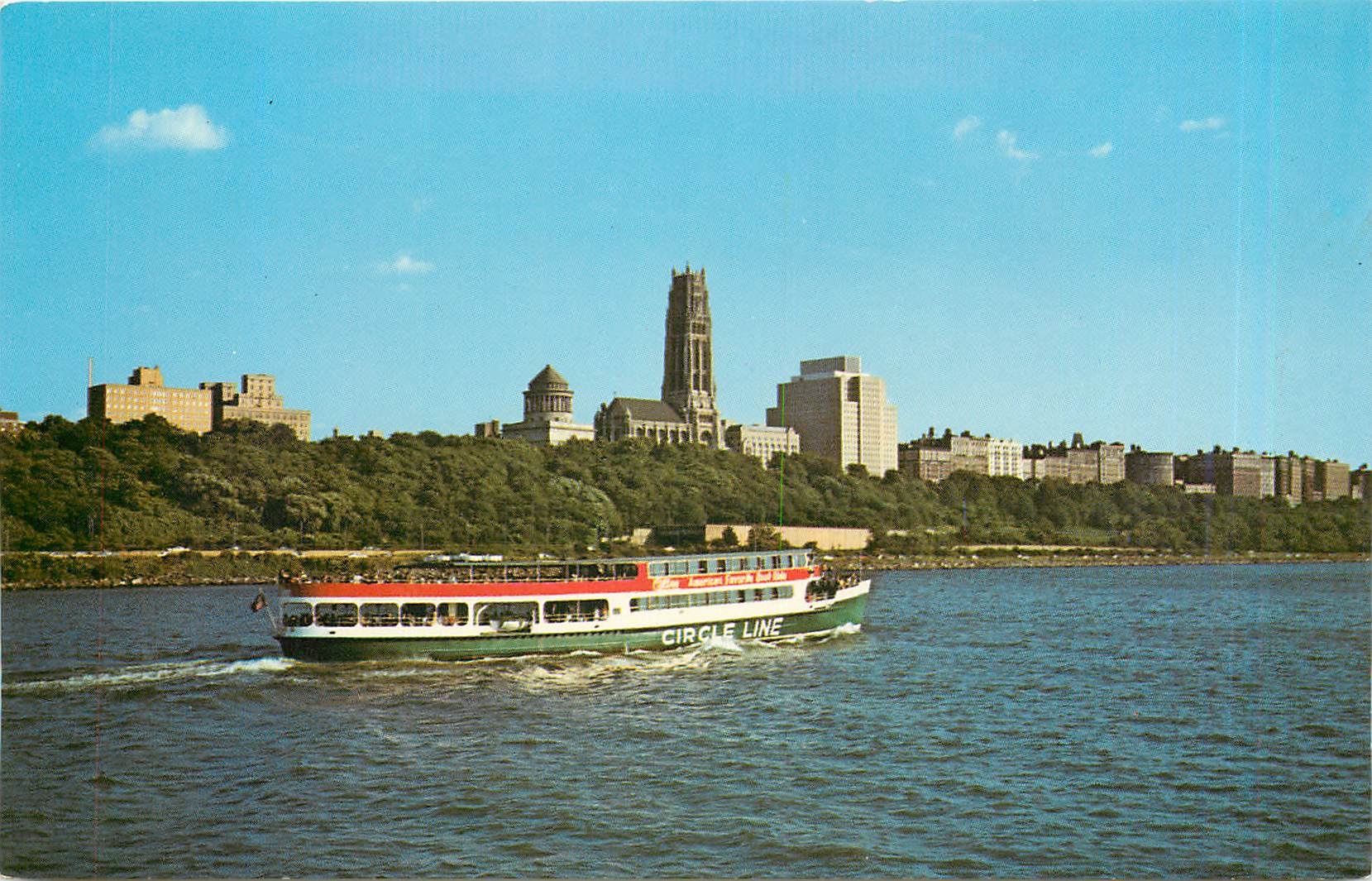 CPM Circle Line yacht cruising the Hudson River with Riverside Church Grant's Tomb and the Inter-Chu