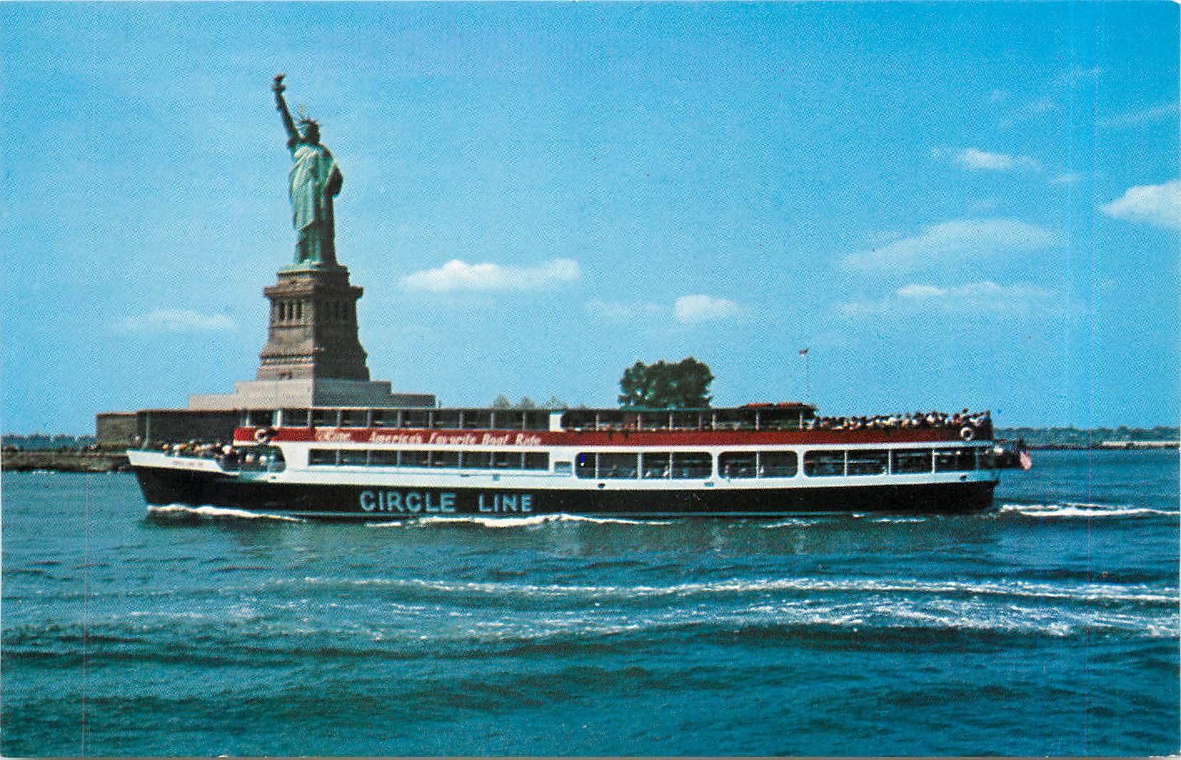 CPM Circle Line yacht with the Statue of Liberty in the background. New York City Bateau