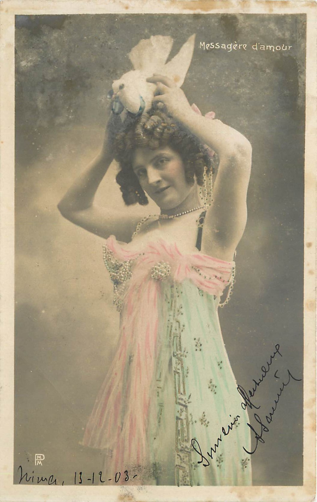 Femme en robe colorée tenant une colombe — 'Messagère d'amour' — Nima, n° de série non lisible