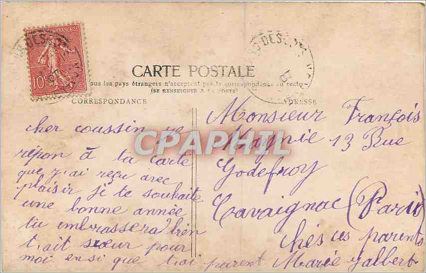 Jeune femme tenant une carte postale — jeu de devinette — J.K. — Rückseite