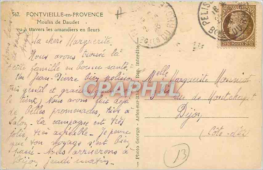 CPA Fontvieille en Provence Moulin de Daudet vu a travers les amandiers en fleurs Moulin — Verso
