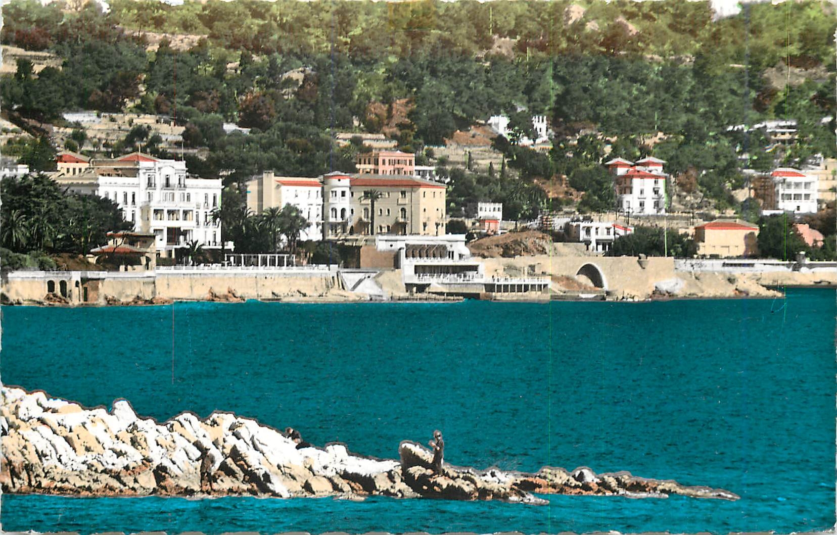 CPM Cote d'Azur Beaulieu sur Mer et ses grands hotels au bord de mer la reserve et l'Hotel Metropole