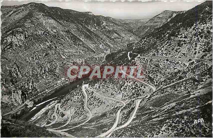 CPM En Parcourant les Gorges du Tarn Les lacets de la route de la Malene a l'Aven Armand et la Valle