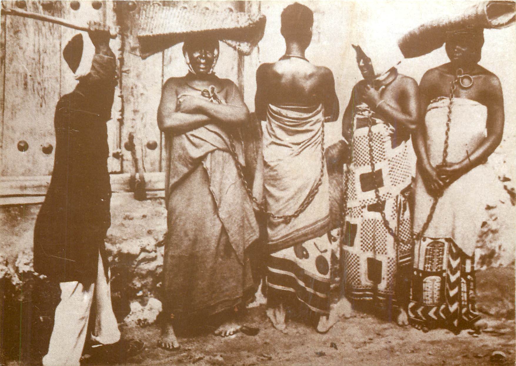 CPM Domestic slaves chained to each other not showing much fear aged supervisor 