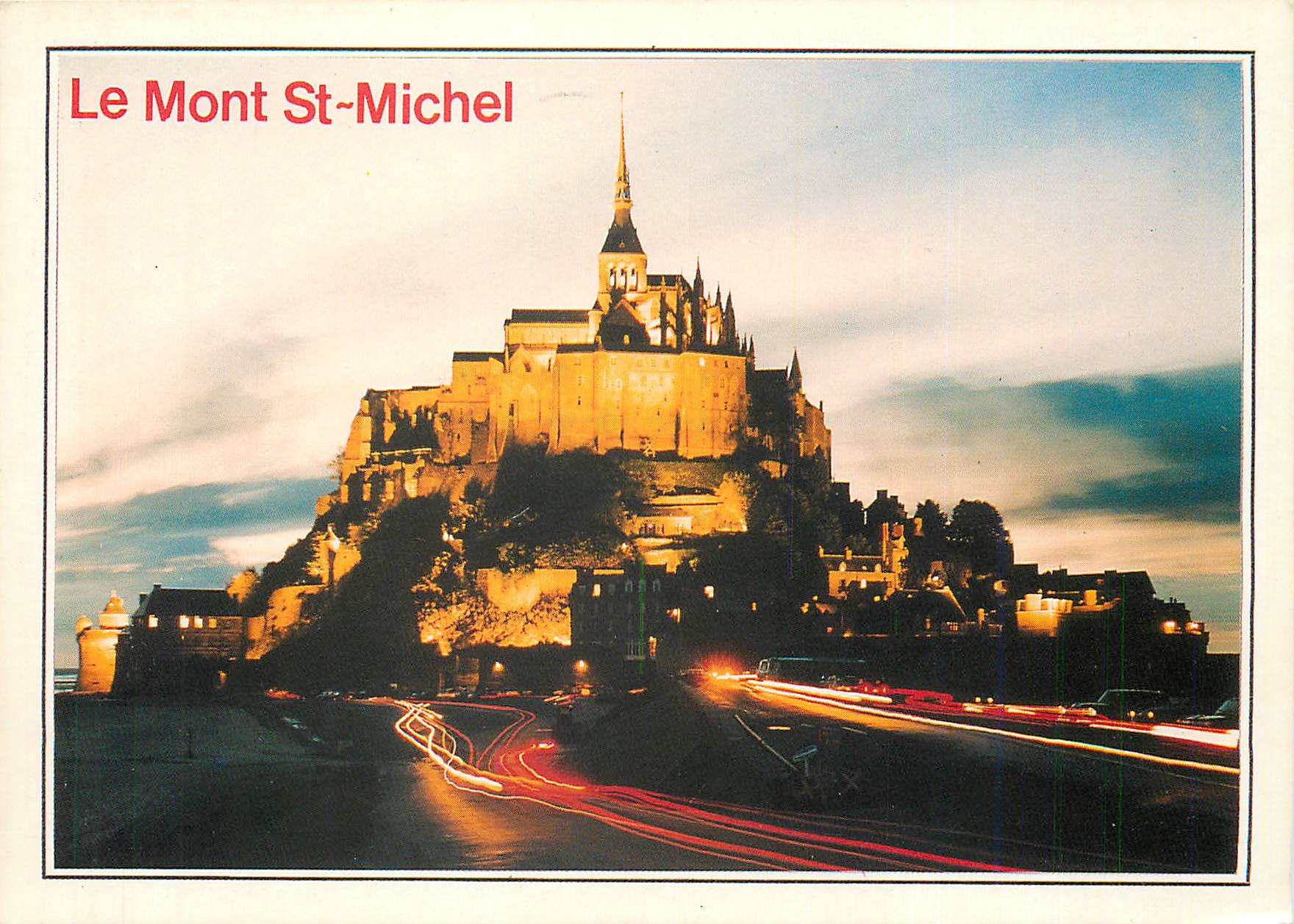 Le Mont St-Michel — vue nocturne avec traînées lumineuses — Éditions Dubray, n°1215/50
