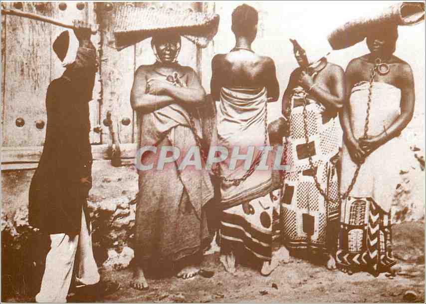 CPM Domestic slaves chained to each other not showing fear of their aged supervisor Zanzibar