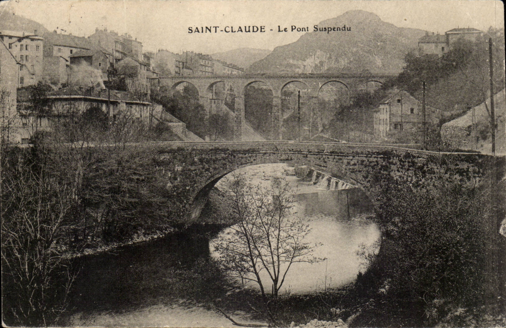 Jura-Touriste- St-Claude et le Pont suspendu long 150m haut 50m-CPA