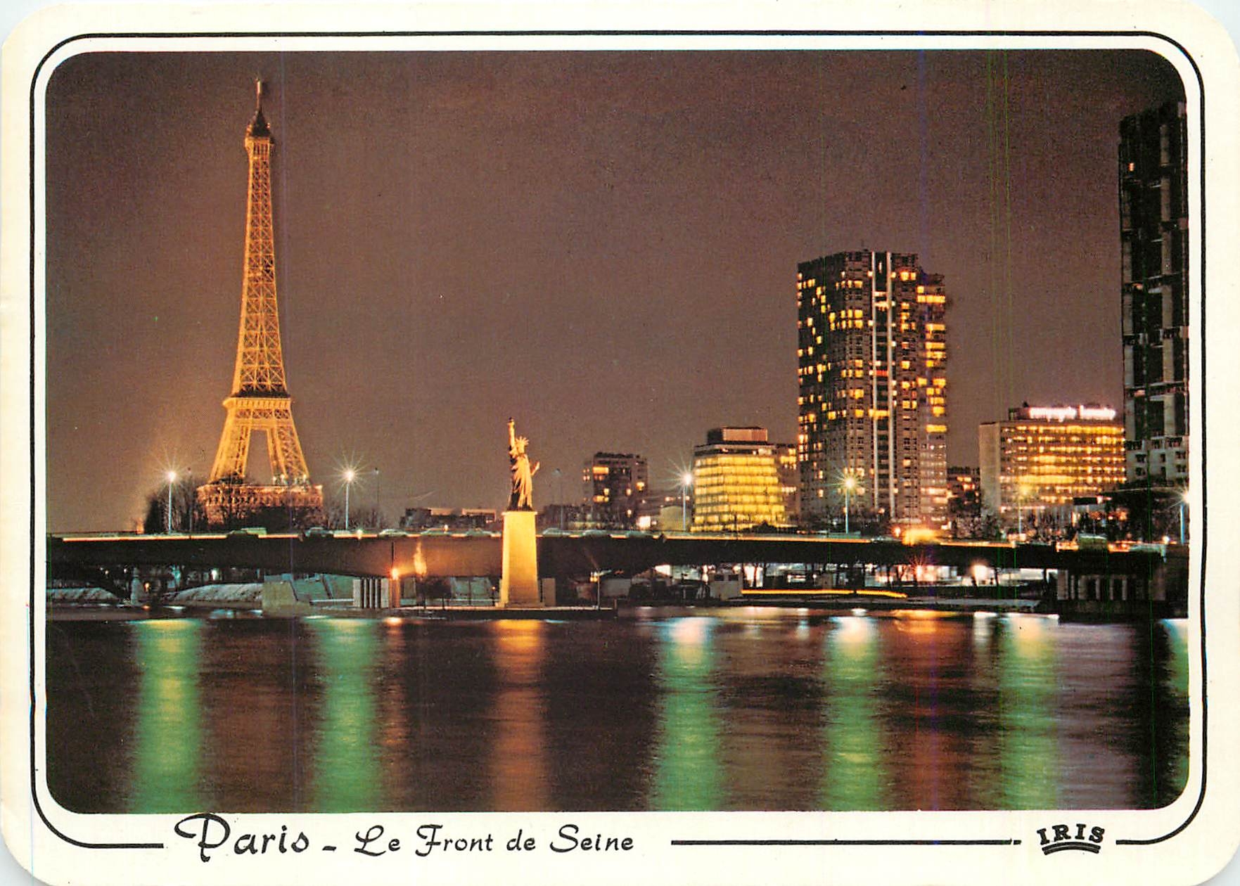 CPM Paris Au de la statie de la Liberte et du Front de Seine la Tour Eiffel illuminee 