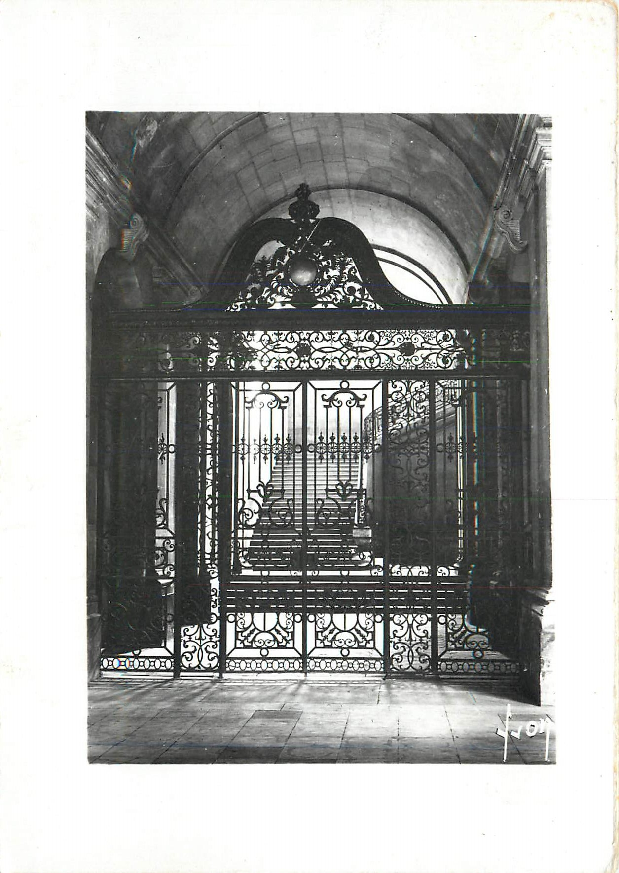 Forged iron gate — entrance of an arcade building — publisher L. JOY, No. 101