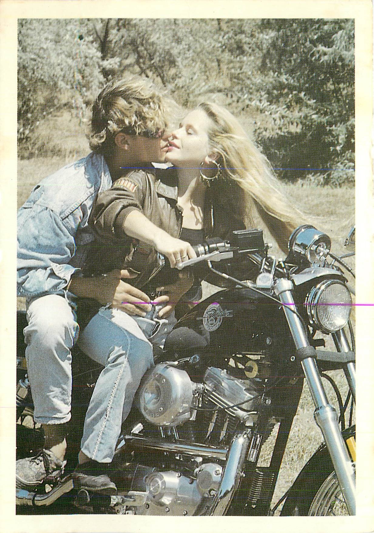 CPM Couple on bike Moto