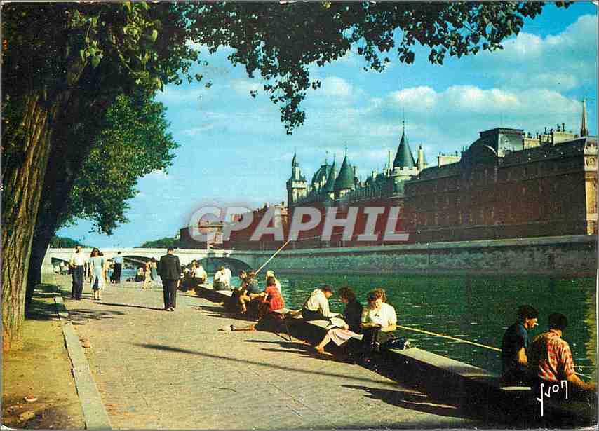 CPM Paris Les bords de la seine Quai de la Megisserie et Palais de Justice