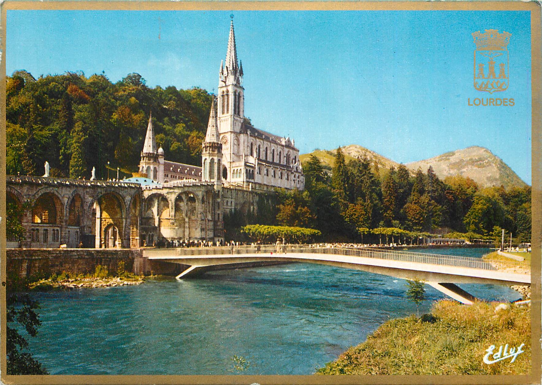 CPM Lourdes (H P) La Basilique le Gave et les nouveaux Pont inaugures le 25 mars 1966
