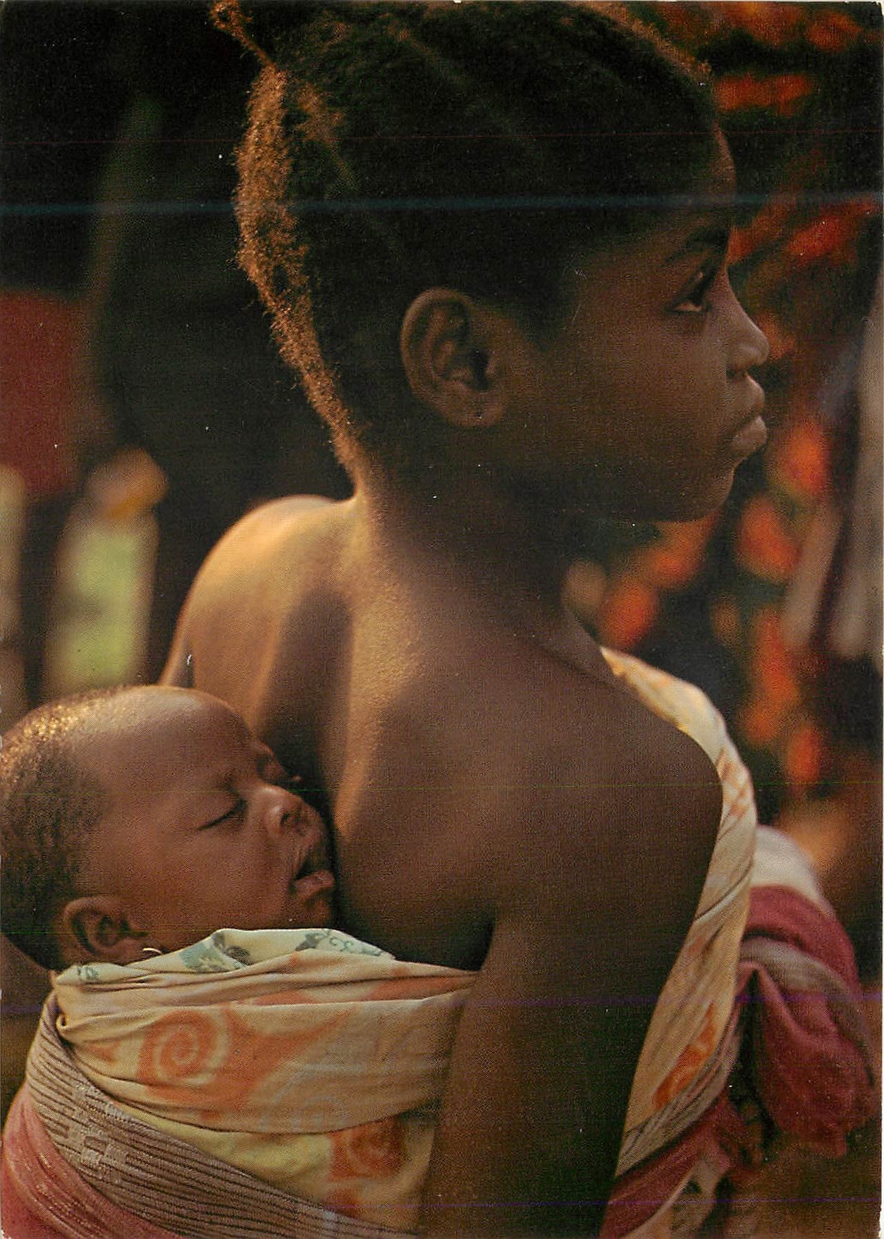 CPM Yoruba girl with baby Lagos Nigeria 