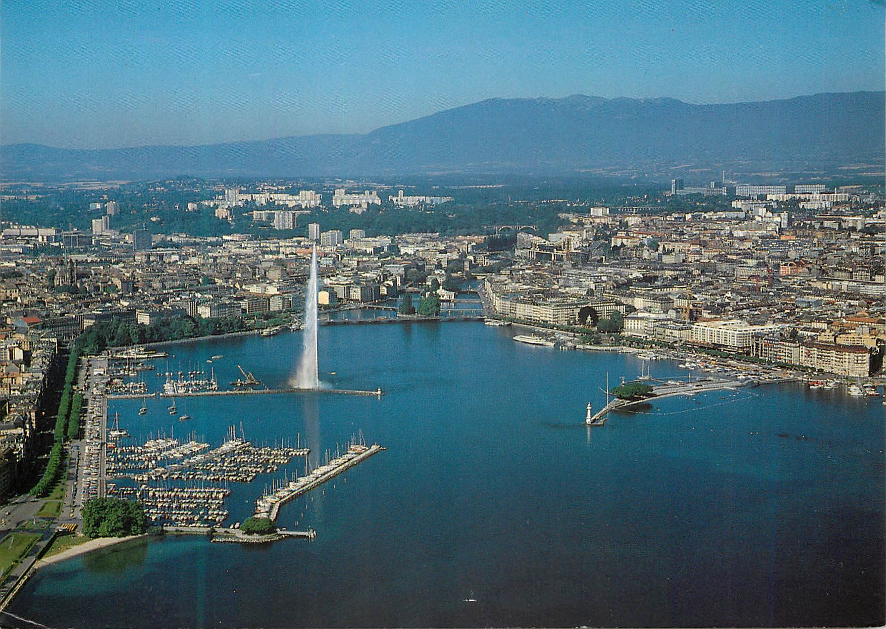 CPM Geneve Le quai des Eaux Vives le jet d eau et la ville 