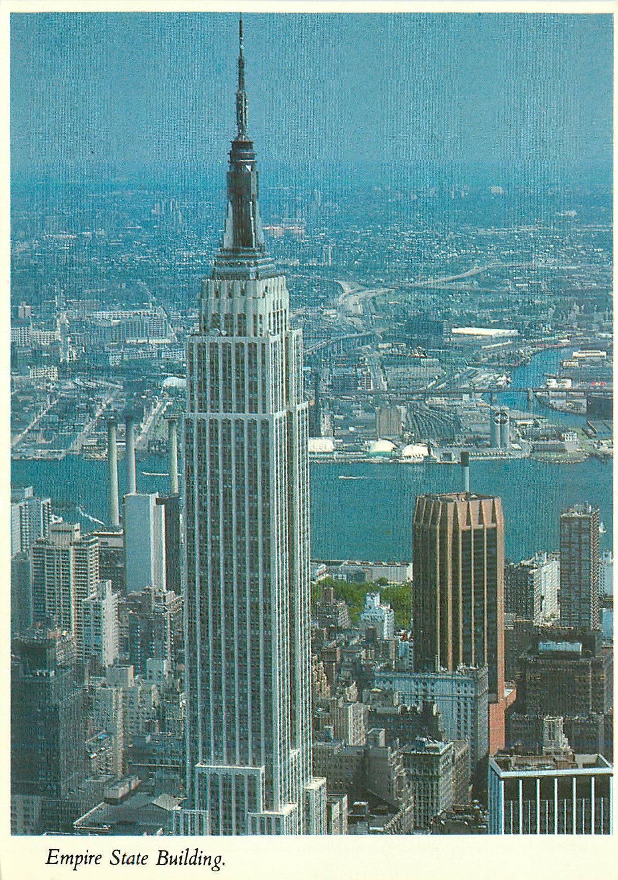 CPM Empire state building showing the east river and queens in the background